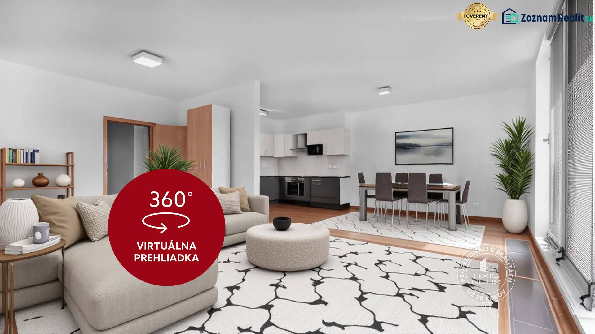 Obývací pokoj ve 3-pokojovém bytě s pohovkou, jídelním stolem a kuchyňskou linkou.