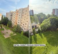 Pohled z 1-pokojového bytu na Kyjevské ulici v Trenčíně s okolními paneláky a zelení.