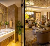 Luxusní koupelna a obývací pokoj ve výstavbě bytů s elegantním designem a doplňky.