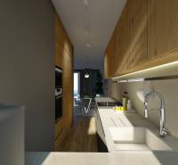 Kuchyně ve 4-pokojovém bytě s dřevěným nábytkem a pracovní deskou.