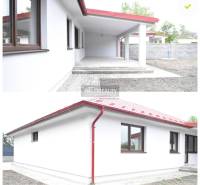 Rodinný dům v Závodě představuje bílou fasádu s červenou střechou a přístřeškem.