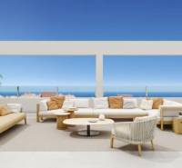 Terasa rekreačního apartmánu v Torrevieja s posezením, oceán a modrá obloha v pozadí.