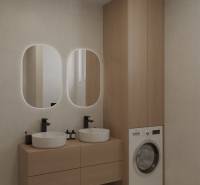 Koupelna s dřevěným nábytkem a dvěma umyvadly, pračka na praní prádla.