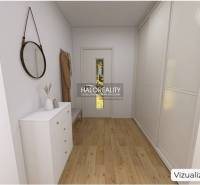 Interiér rodinného domu s podlahou s dřevěným dekorem, bílou komodou a zrcadlem.