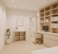 Pracovní kout s vestavěnou knihovnou ve 4pokojovém bytě s podlahou s dřevěným dekorem.