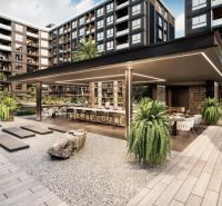 Výstavba bytů v Pattayi s moderním venkovním prostorem a zahradní architekturou.