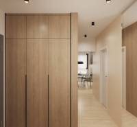 Interiér s podlahou s dřevěným dekorem a vestavěnou skříní.