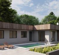 Rodinný dům v Žihárci s bazénem, terasou, lehátky a okolní zelení.