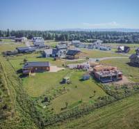 Výhled na rozvíjející se lokalitu a domy v Mlynici pro pozemky - bydlení.