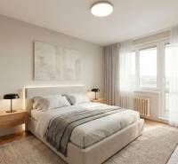 Ložnice v dvoupokojovém bytě s velkou postelí a podlahou s dřevěným dekorem.