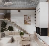 Světlý obývací pokoj v chatě s pohodlnou sedací soupravou a podlahou s dřevěným dekorem.