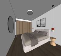 Ložnice v 2-pokojovém bytě s podlahou s dřevěným dekorem a šedými stěnami.