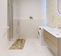 Koupelna s pračkou, sprchou, umyvadlem a zrcadlem v 1-pokojovém bytě s detaily z mramoru.