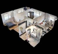 3D půdorys 3pokojového bytu s podlahou s dřevěným dekorem a zařízením.