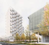 Výšková budova u ulice Mlynské nivy v Bratislavě-Ružinově s podzimními stromy.