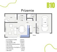 Půdorys přízemí rodinného domu s obývacím pokojem, kuchyní a garáží.