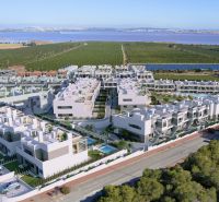 Výhled na rezidenční komplex sahající až k laguně v Torrevieji, nabízející 2pokojové byty.