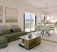 Světlý obývací prostor rekreačního apartmánu s pohovkou a jídelním stolem.