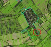 Letecká mapa se zaměřením na pozemky pro bydlení v Radnovcích, viditelná pole a cesty.