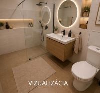 Moderní koupelna s dřevem, sprchovým koutem, osvětleným zrcadlem a dekorativními prvky v 2pokojovém bytě.