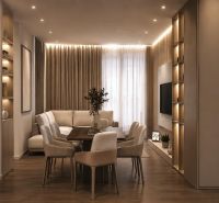 Interiér rekreačního apartmánu s pohodlným posezením, jídelním stolem a podlahou s dřevěným dekorem.