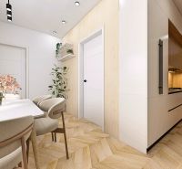 Interiér 2-pokojového bytu s podlahou s dřevěným dekorem a elegantním jídelním stolem.