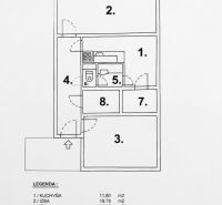 Půdorys 2-pokojového bytu s balkonem, kuchyní a šatníkem na 65,15 m².