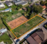 Pozemky - bydlení na ulici Malé Blahovo v Dunajské Stredě obklopené zelení.