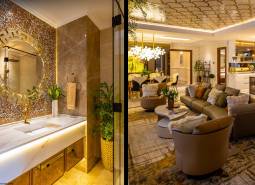 Luxusní koupelna a obývací pokoj ve výstavbě bytů s elegantním designem a doplňky.