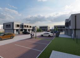 Ulice s novými domy na Triblavinské v Chorvatském Grobu, parkování a lidé v exteriéru.