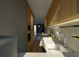 Kuchyně ve 4-pokojovém bytě s dřevěným nábytkem a pracovní deskou.