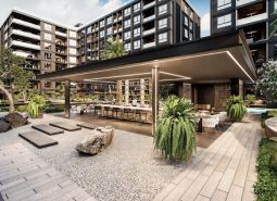 Výstavba bytů v Pattayi s moderním venkovním prostorem a zahradní architekturou.