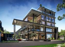 Výstavba bytů v Pattayi se skleněnými fasádami a zelení v okolí.