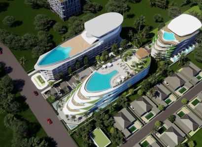 Vizualizace výstavby bytů v Phuketu: vícepodlažní budovy s bazény obklopené zelení a cestou.