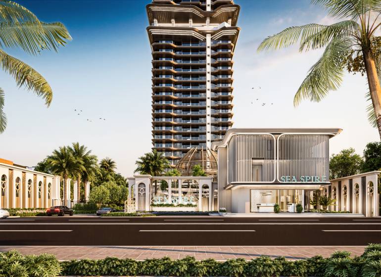 Výstavba bytů v Pattayi ukazuje výškovou budovu obklopenou palmami.