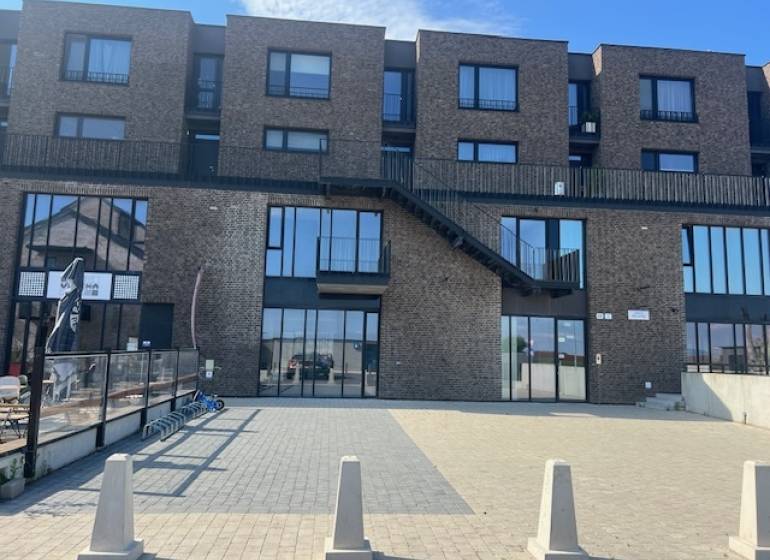 Exteriérový pohled na bytový komplex v Bratislavě - Jarovce na Náměstí při Sýpce.