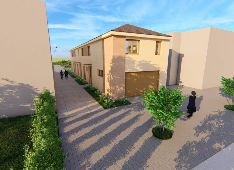 Dvoupatrová budova s cestou na Litoměřické ulici v Topoľčiankách, s okolními stromy.