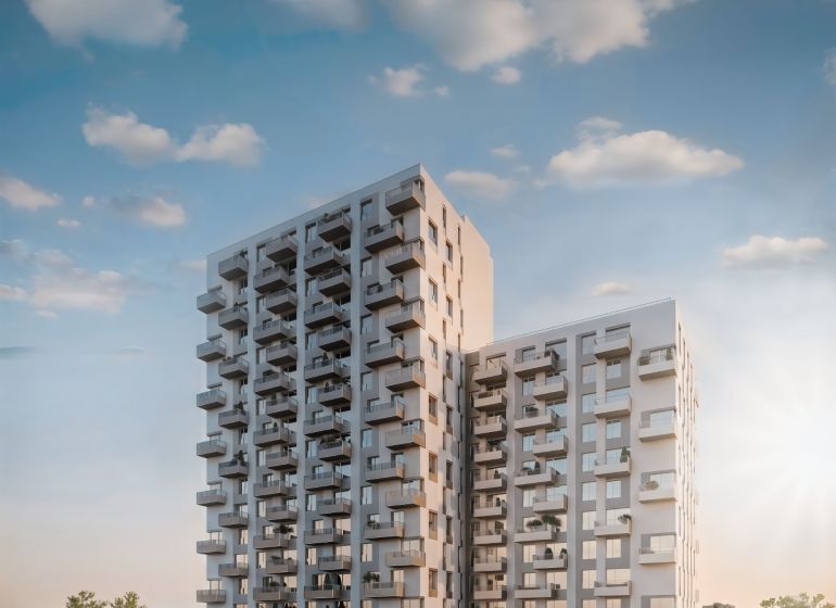 Výšková budova na Mlynských Nivách v Bratislavě - Ružinově s balkony a zelení.