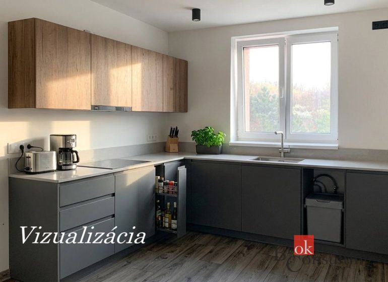Kuchyně v 1-pokojovém bytě s podlahou s dřevěným dekorem a kuchyňskou linkou.