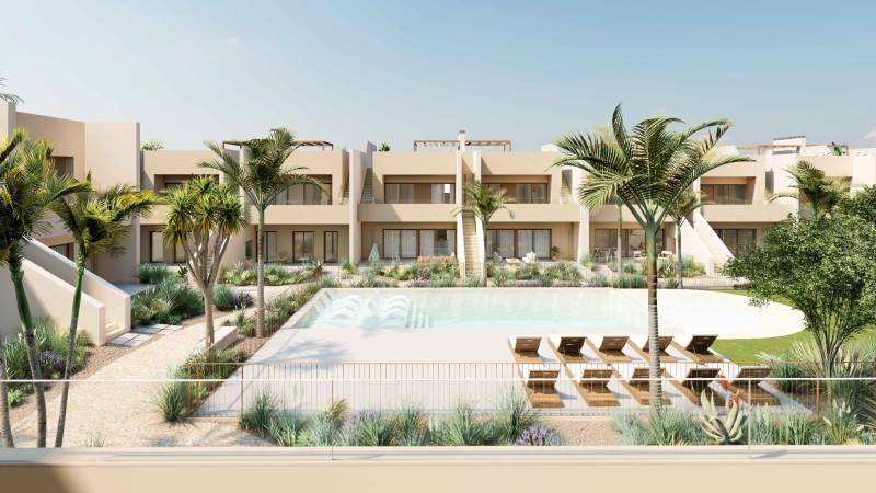 Apartmánový komplex s bazénem a palmami na Rhodu, ideální místo pro relaxaci.