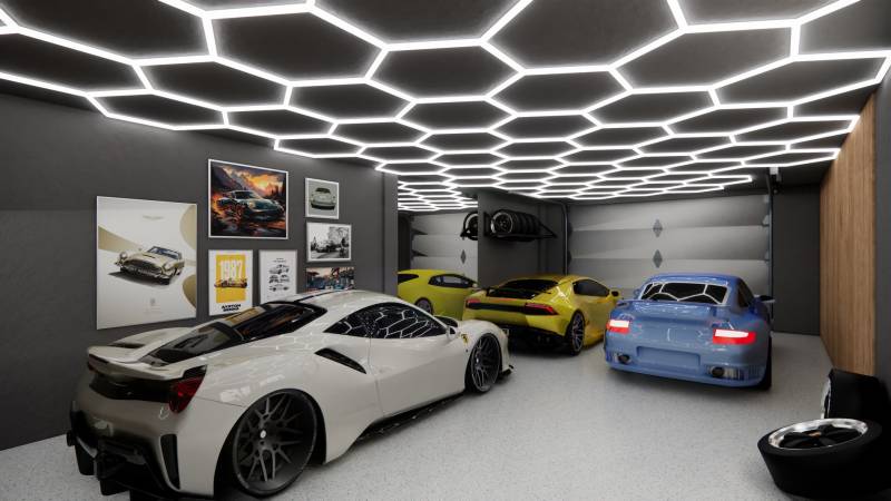 Designová garáž s luxusními auty, dekoracemi a výrazným osvětlením v obchodních prostorách.