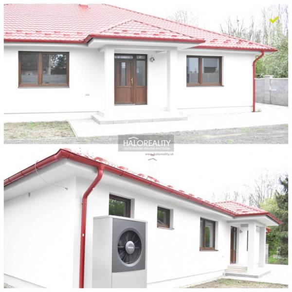 Rodinný dům v Závodě se světlou fasádou a červenou střechou, vhodný pro energeticky úsporné bydlení.