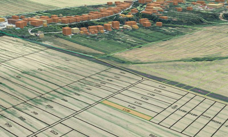 Letecký pohled na zemědělské a lesní pozemky v Nové Vsi nad Váhem.