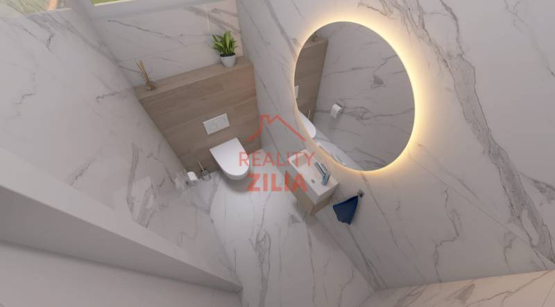 Koupelna s kruhovým zrcadlem, sanitou a dekorativními obklady v rodinném domě.