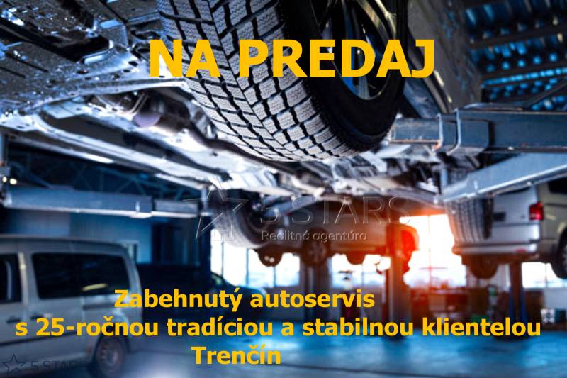 Interiér autoservisu s automobilem na zvedáku, prodej v Trenčíně, sklady a haly.