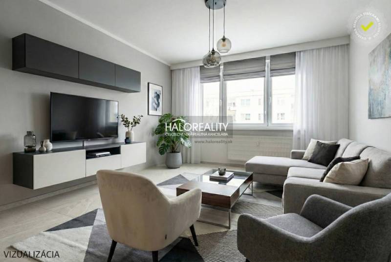 Obývací pokoj ve 3-pokojovém bytě s velkou pohovkou, TV, koberec, podlaha s dřevěným dekorem.