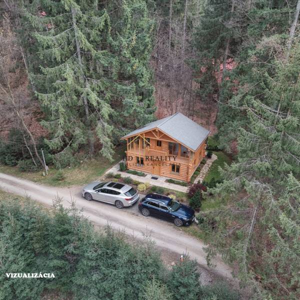 Chata v lesním prostředí na ulici Krpáčovo v Krpáčově obklopená stromy a přírodou.