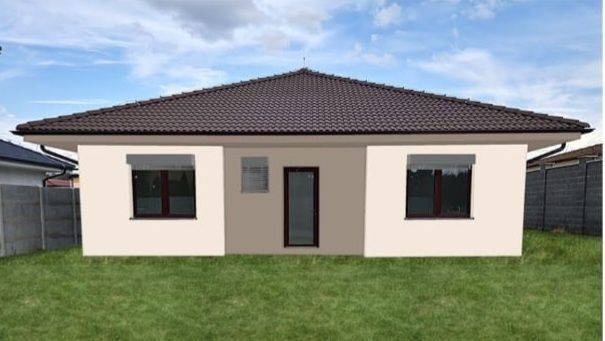 Rodinný dům v Kolonii, Galanta, s tmavou střechou a travnatou zahradou.