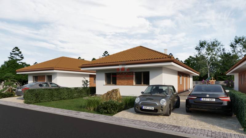 Rodinný dům na ulici Veselé ve městě Veselé se dvěma automobily na příjezdové cestě.