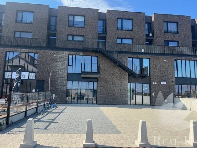 Exteriérový pohled na bytový komplex v Bratislavě - Jarovce na Náměstí při Sýpce.